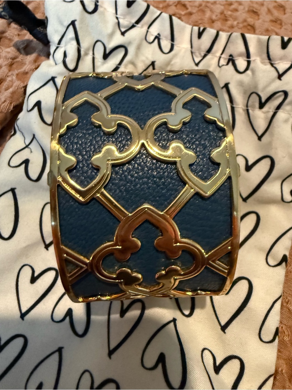 Gold tone cuff reversible leather insert